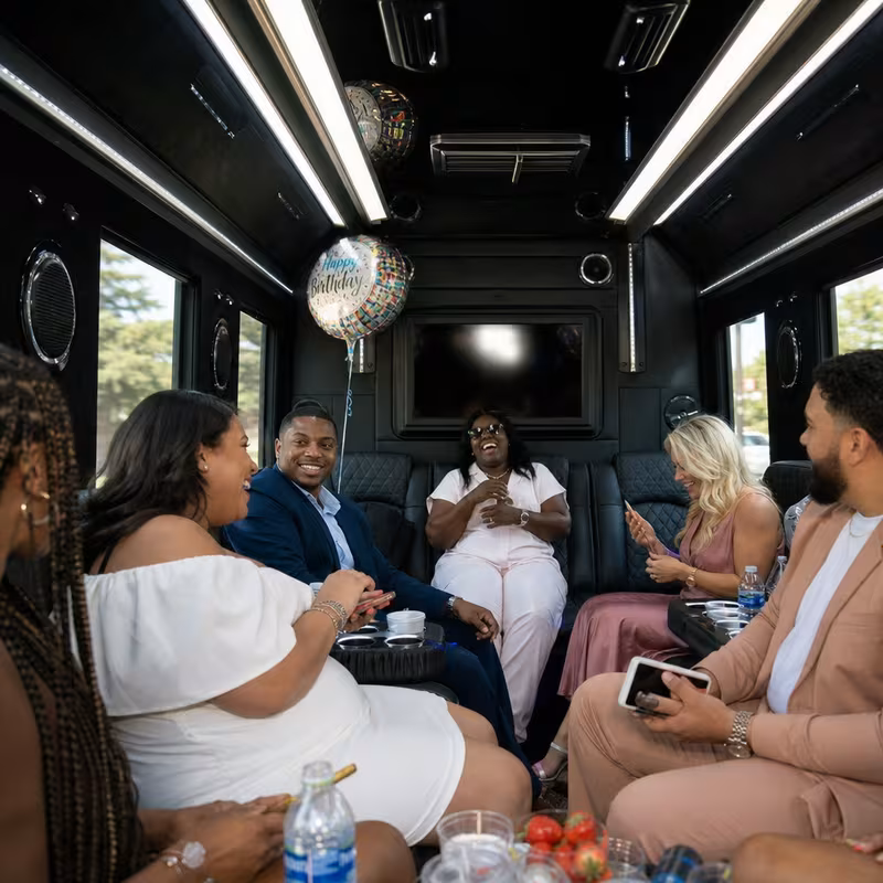 Black Mercedes Sprinter van staged for a Long Beach Birthday Transportation group