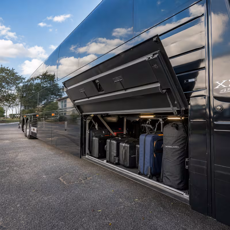 Party bus interior with wraparound leather seating and LED lighting in Long Beach