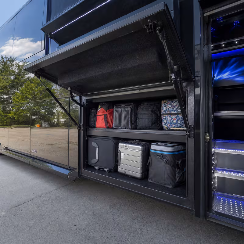 Party bus interior with wraparound leather seating and LED lighting in Long Beach